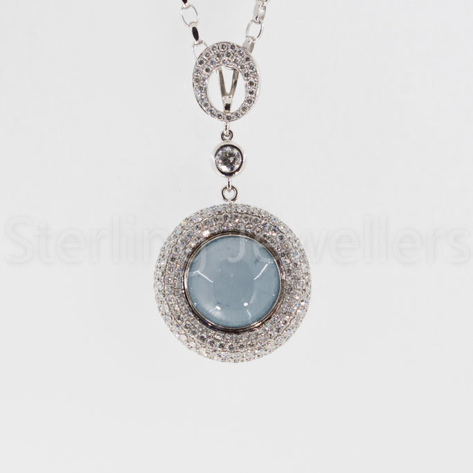 18ct w/g aquamarine diamond pendant