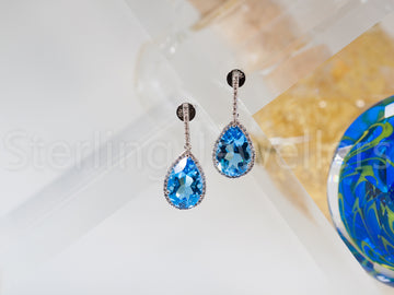 18ct w/g Topaz and diamond earrings